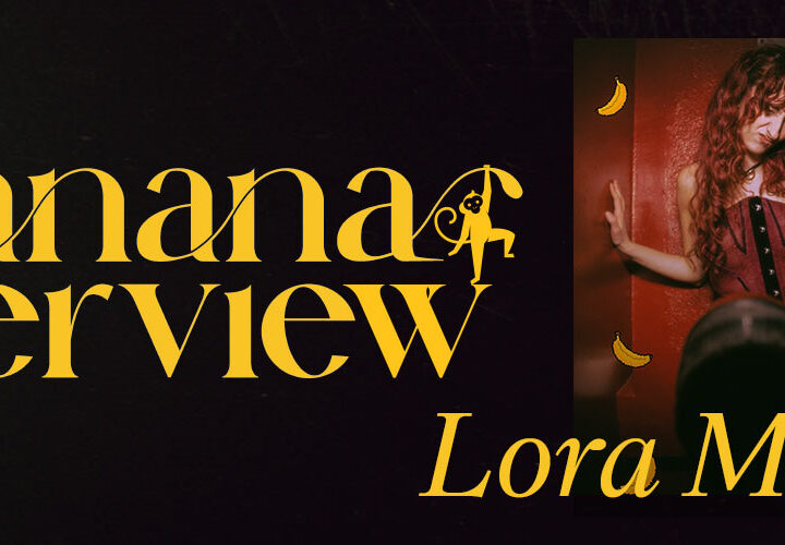 Banana Interview with Lora Mouna: A turning tree in autumn against the sky at dusk.